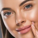 Female beautiful face eyes and smile spa concept